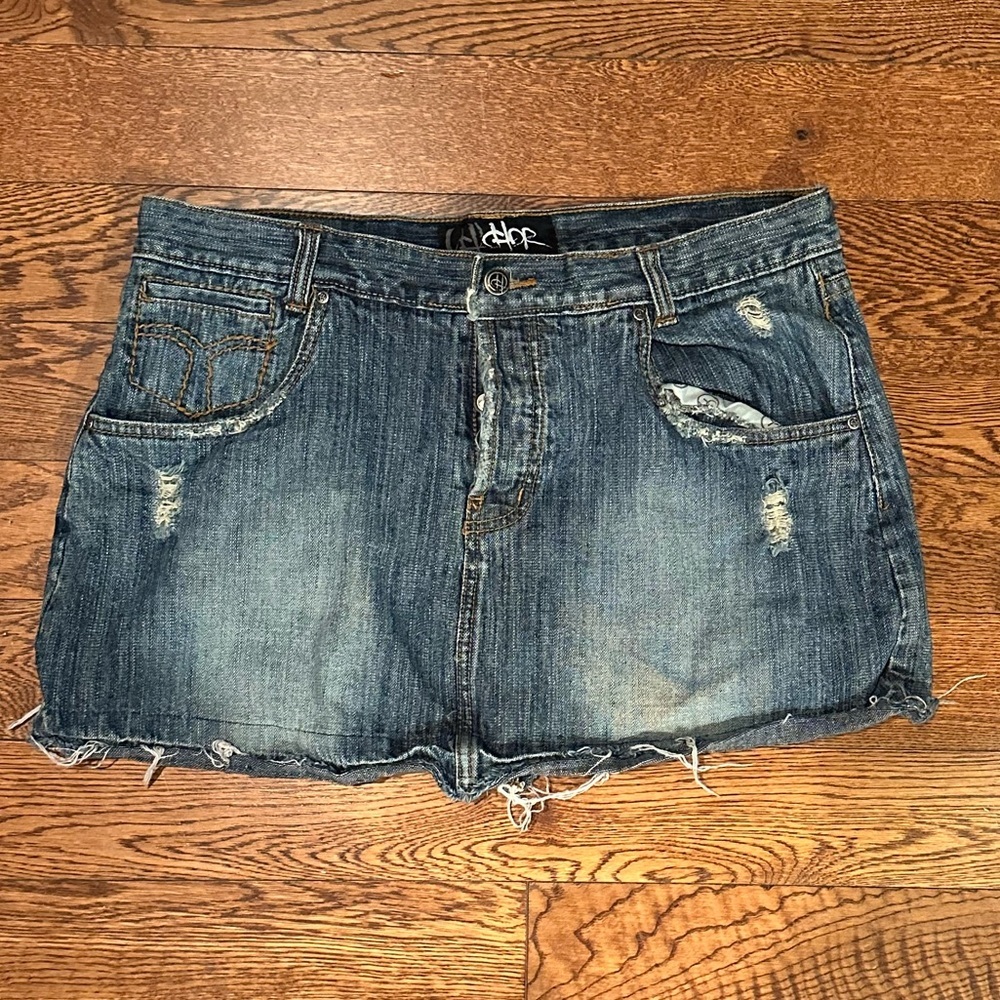 Denim micro mini skirt with stud detail​